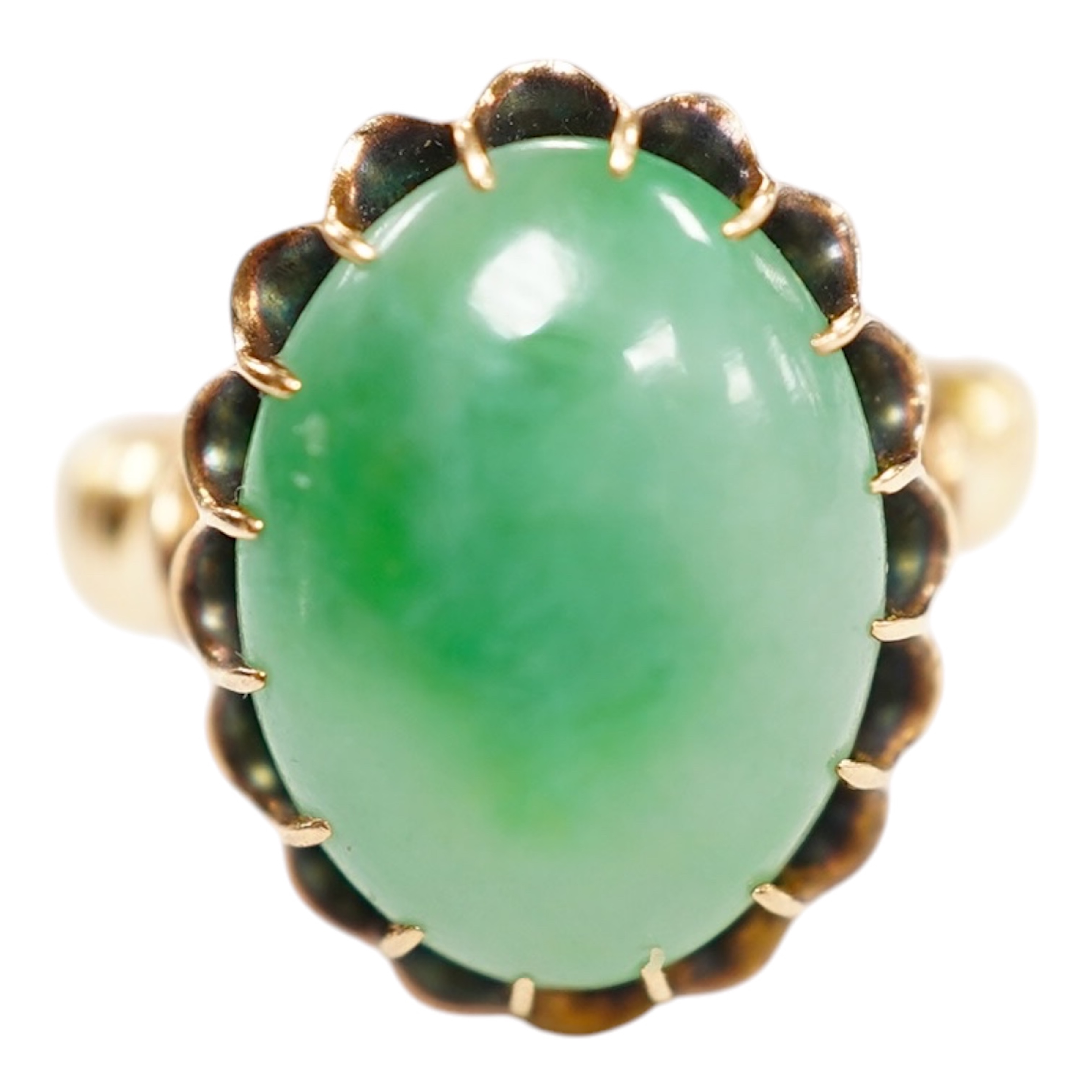 A mid 20th century yellow metal and single stone cabochon jade set ring, size Q, gross weight 5.6 grams. Condition - fair